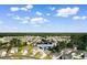 Aerial view of the home's location within a neighborhood of well-maintained homes and mature trees at 1128 Sennema Circle, Myrtle Beach, SC 29588