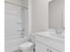 Bathroom features a white vanity, toilet, and tub-shower combination for a clean, modern look at 1128 Sennema Circle, Myrtle Beach, SC 29588
