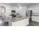 Bright kitchen with granite countertops, stainless appliances, and white cabinets at 1128 Sennema Circle, Myrtle Beach, SC 29588