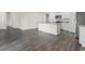 Open-concept kitchen with stainless steel appliances and a kitchen island with granite countertops at 1128 Sennema Circle, Myrtle Beach, SC 29588