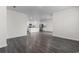 Spacious living room with open layout and modern gray luxury vinyl plank flooring at 1128 Sennema Circle, Myrtle Beach, SC 29588