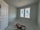 Bright, unfinished bedroom with double windows offering a view, awaiting final touches and personalization at 1205 Grinnell St., North Myrtle Beach, SC 29582