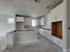 New kitchen with white cabinets and a kitchen island at 1205 Grinnell St., North Myrtle Beach, SC 29582
