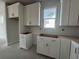 New kitchen featuring white cabinets and plenty of storage at 1205 Grinnell St., North Myrtle Beach, SC 29582
