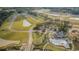 An impressive aerial view showing the neighborhood layout, community pool, clubhouse and green spaces at 1239 Maxwell Dr., Little River, SC 29566