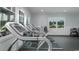 Fitness center with treadmills overlooking an outdoor view and weights in the corner at 1239 Maxwell Dr., Little River, SC 29566