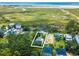 Aerial view of the property location highlighting a tranquil community near the marsh and waterway at 127 Brown Pelican Loop, Pawleys Island, SC 29585