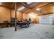 Large garage with ample room for vehicles and outdoor equipment and tools at 127 Brown Pelican Loop, Pawleys Island, SC 29585