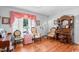 Vintage style living room featuring wood floors and traditional furniture at 12721 Pleasant Hill Dr., Hemingway, SC 29554