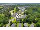 Scenic aerial view featuring a well-planned community with a lake, golf course, and lush greenery at 1428 Lanterns Rest Rd. # 1428, Myrtle Beach, SC 29579