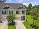 Aerial view of a townhome complex with well-maintained lawns and mature trees at 1428 Lanterns Rest Rd. # 1428, Myrtle Beach, SC 29579
