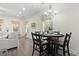 Cozy dining area featuring a round table with seating for four and decorative curtains at 1428 Lanterns Rest Rd. # 1428, Myrtle Beach, SC 29579
