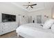 This spacious main bedroom includes a large dresser and television, plus ensuite bathroom access at 1428 Lanterns Rest Rd. # 1428, Myrtle Beach, SC 29579