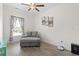 A comfortable office with a gray couch and lots of natural light at 1428 Lanterns Rest Rd. # 1428, Myrtle Beach, SC 29579