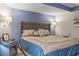 Warm and inviting bedroom with a king bed, soft lighting, and a soothing color palette at 1501 S Ocean Blvd. # 1548, Myrtle Beach, SC 29577