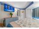 Inviting bedroom features a flat screen television and decor for a relaxing entertainment experience at 1501 S Ocean Blvd. # 1548, Myrtle Beach, SC 29577