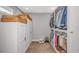 Walk-in closet with custom storage solutions, including shelves, hanging rods, and stylish baskets at 15810 County Line Rd., Andrews, SC 29510