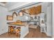 Modern kitchen featuring sleek countertops, stainless steel appliances, custom cabinets and a stylish breakfast bar at 15810 County Line Rd., Andrews, SC 29510