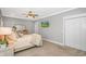Relaxing main bedroom with plush carpet and an accent wall with modern decor at 15810 County Line Rd., Andrews, SC 29510