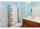 Cozy bathroom with shower and tub combination with a dark wood vanity and sink at 1590 Palmina Loop # A, Myrtle Beach, SC 29588