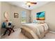Cozy bedroom with striped bedding, surf decor, and window with view of the outdoors at 1590 Palmina Loop # A, Myrtle Beach, SC 29588