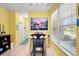 Cozy breakfast nook with a view from the window and bright yellow walls at 1590 Palmina Loop # A, Myrtle Beach, SC 29588