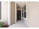 Inviting front entryway with a dark-colored door and a charming welcome mat at 1590 Palmina Loop # A, Myrtle Beach, SC 29588