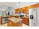 Well-equipped kitchen with stainless steel appliances, granite counters, and a central island at 1590 Palmina Loop # A, Myrtle Beach, SC 29588