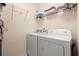 A laundry room features a washing machine and dryer, providing convenience for laundry needs at 1590 Palmina Loop # A, Myrtle Beach, SC 29588