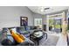 Inviting living room with plush gray sectional sofa and sliding glass door to the outside at 1590 Palmina Loop # A, Myrtle Beach, SC 29588