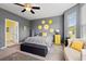 Serene main bedroom with grey walls, decorative accents, and ample natural light at 1590 Palmina Loop # A, Myrtle Beach, SC 29588