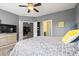 Tastefully decorated main bedroom with ensuite bathroom and open doorway to living room at 1590 Palmina Loop # A, Myrtle Beach, SC 29588