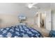 Bedroom featuring a TV, storage cabinet, coastal decor, and a cozy chair with ottoman at 178 Parmalee Dr. # C, Murrells Inlet, SC 29576
