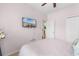 Comfortable bedroom featuring carpet, a flat screen television, and closet at 178 Parmalee Dr. # C, Murrells Inlet, SC 29576