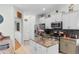 Bright kitchen with granite island, stainless steel appliances, and updated cabinetry for a modern feel at 178 Parmalee Dr. # C, Murrells Inlet, SC 29576