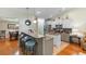 Modern kitchen featuring granite countertops, a breakfast bar, stainless steel appliances, and pendant lighting at 178 Parmalee Dr. # C, Murrells Inlet, SC 29576