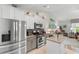 Updated kitchen with stainless steel appliances, granite counters, and an island, blending style and functionality at 178 Parmalee Dr. # C, Murrells Inlet, SC 29576