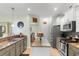 Bright kitchen boasts granite counters, a center island, and stainless steel appliances at 178 Parmalee Dr. # C, Murrells Inlet, SC 29576
