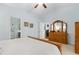 Serene main bedroom with soft carpet, a dresser, and views of the ensuite bath at 178 Parmalee Dr. # C, Murrells Inlet, SC 29576