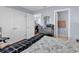 Bedroom featuring hardwood floors, a view into the office, and white closet doors at 1857 Culbertson Ave. # 1857, Myrtle Beach, SC 29577