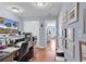 Home office featuring a built-in desk, wood floors, a large TV, and ample storage space at 1857 Culbertson Ave. # 1857, Myrtle Beach, SC 29577