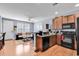 Open-concept kitchen flows into the living area, featuring stainless steel appliances at 1857 Culbertson Ave. # 1857, Myrtle Beach, SC 29577