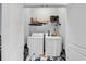 Convenient laundry room with a washer, dryer, and shelving for storage at 1857 Culbertson Ave. # 1857, Myrtle Beach, SC 29577