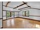 Finished attic with exposed beams, natural light, and hardwood floors at 203 Lakeland Dr., Conway, SC 29526