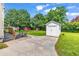 Well-maintained backyard with patio, storage shed, and ample green space at 203 Lakeland Dr., Conway, SC 29526