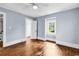 Inviting bedroom featuring natural light, hardwood floors, and neutral tones at 203 Lakeland Dr., Conway, SC 29526