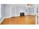 Living room featuring hardwood floors, a fireplace, and natural light at 203 Lakeland Dr., Conway, SC 29526
