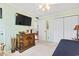 Light and airy bedroom with hard floors, a ceiling fan, and plenty of storage at 208 Millwood Dr., Surfside Beach, SC 29575