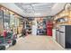 Spacious garage with ample storage shelving, tool racks, and a functional layout at 208 Millwood Dr., Surfside Beach, SC 29575