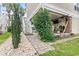 Back patio is great for relaxing with TV, ceiling fan, and easy access to the upper level via exterior stairs at 208 Millwood Dr., Surfside Beach, SC 29575